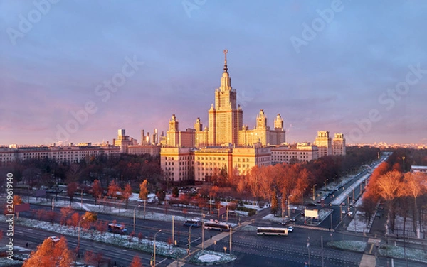 Fototapeta Wide angle panoramic view of sunset Moscow university campus under dramatic sky in spring