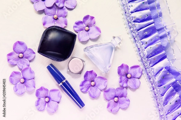 Obraz Beautiful cosmetic jars and boxes with flowers hydrangeas and pearls on white background