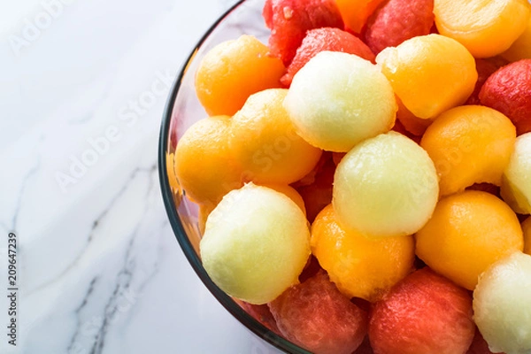 Obraz Summer melon balls on marble background