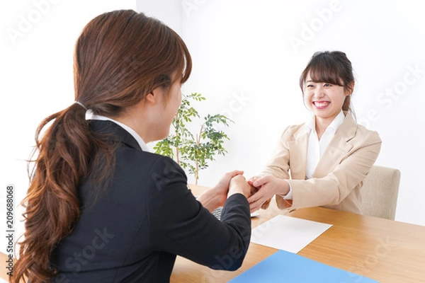 Fototapeta 握手をするビジネスパーソン