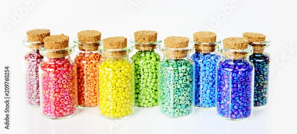 Fototapeta Multicolored beads on a white background