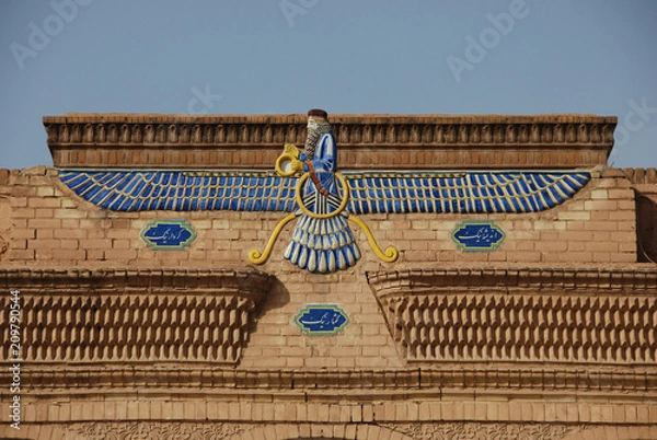 Obraz Zoroastrian symbol Faravahar from the facade of a fire temple in Yazd 