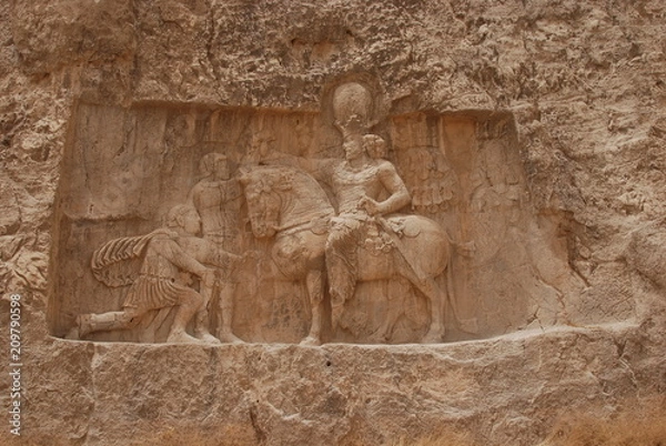 Obraz Relief of Shapur I over the Romens carved in the rock in Naqsh-e Rustam, Iran