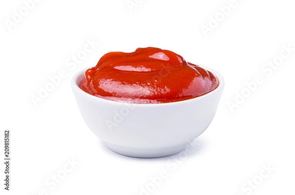 Fototapeta Red tasty ketchup or tomato sauce in bowl isolated on white background