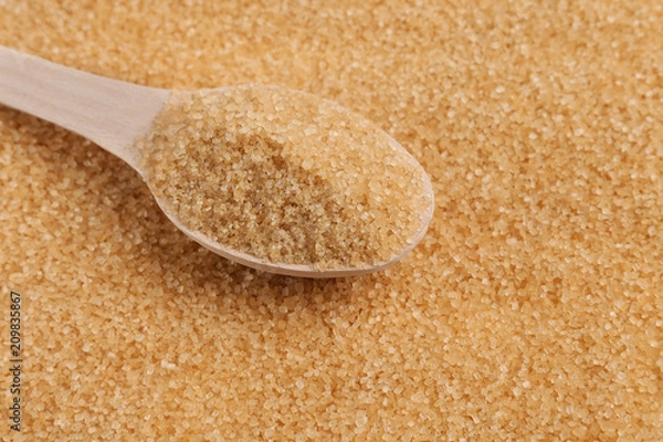 Obraz wooden spoon with cane sugar