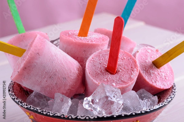 Fototapeta Colorful homemade ice cream from berries with color sticks