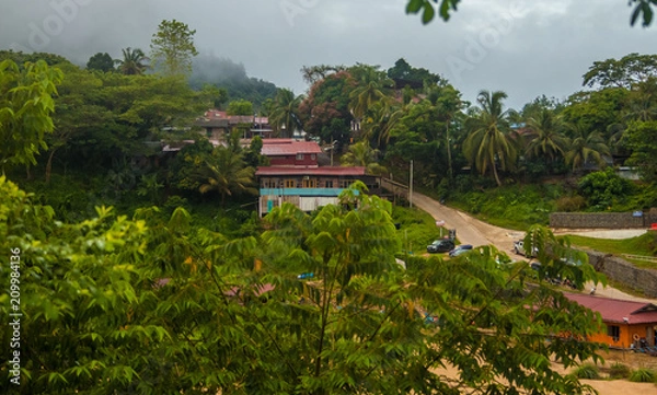 Obraz Beautiful view of Kuala Tahan, a Malaysian village located at the confluence of the Tahan and Tembeling Rivers and gateway to Taman Negara National Park in the state of Pahang.