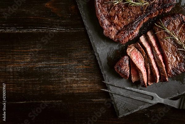 Fototapeta dinner for two with steaks and red wine