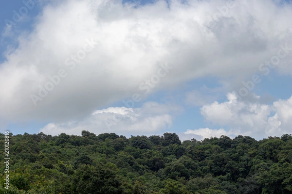 Fototapeta Mountain view and blue sky with beautiful white clouds.