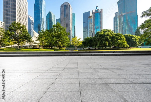 Fototapeta empty square with panoramic city skyline