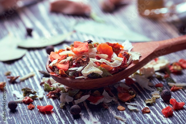 Obraz dried vegetables in a wooden spoon