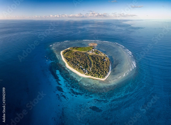 Fototapeta Lady Elliot Island and its coral reef viewed from the sky at sunset