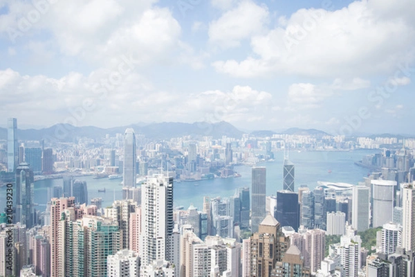Obraz Highrise modern buildings with blue sky in the city at Victoria's Peak, Hong Kong