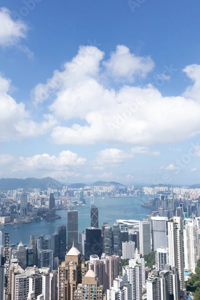 Obraz Highrise modern buildings with blue sky in the city at Victoria's Peak, Hong Kong