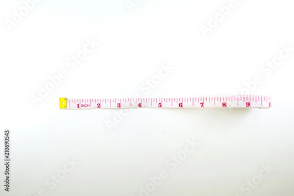 Fototapeta Measure the length of a unit in inches on a white background.