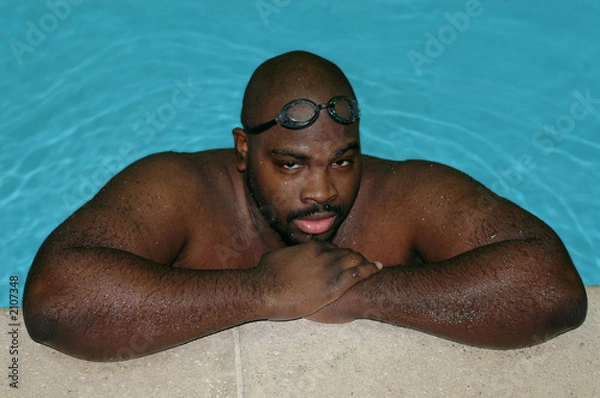Obraz man at an indoor pool