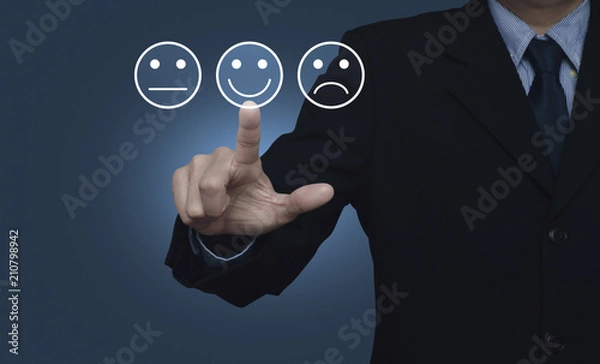 Fototapeta Businessman pressing excellent smiley face rating icon over gradient light blue background, Business customer service evaluation and feedback rating concept