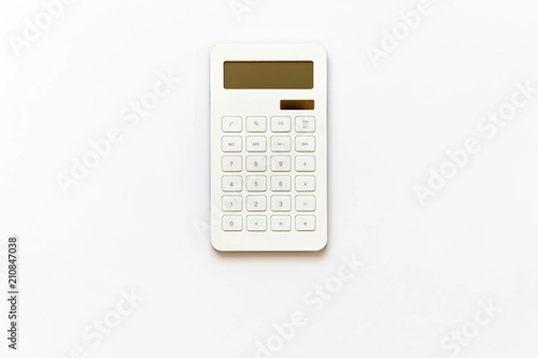 Fototapeta White powered solar calculator isolated on white background viewed from above in studio.
