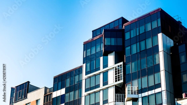 Obraz фрагменты высотных домов с большой площадью остекления фасадов