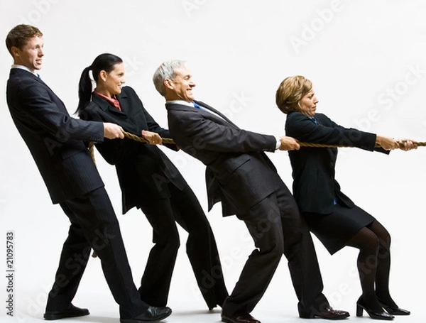 Obraz Business people playing tug-of-war