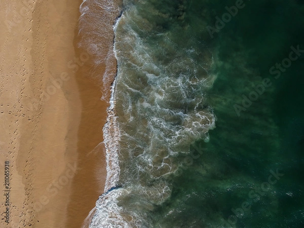 Obraz Breaking waves and sandy waters