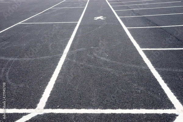 Obraz Empty parking lot with path for pedestrians