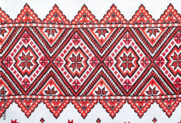 Fototapeta embroidered handmade good by cross-stitch pattern