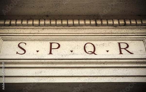 Fototapeta SPQR engraved on stone in Rome, Italy