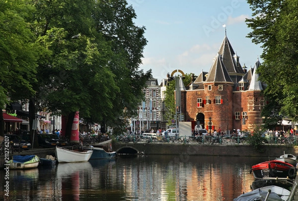 Obraz Kloveniersburgwal channel and De Waag - old scales in Amsterdam. Netherlands