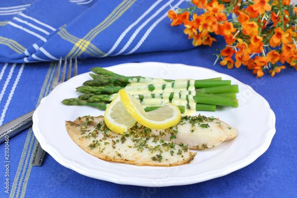 Obraz Healthy, fresh tilapia fillets with asparagus and Hollandaise sa