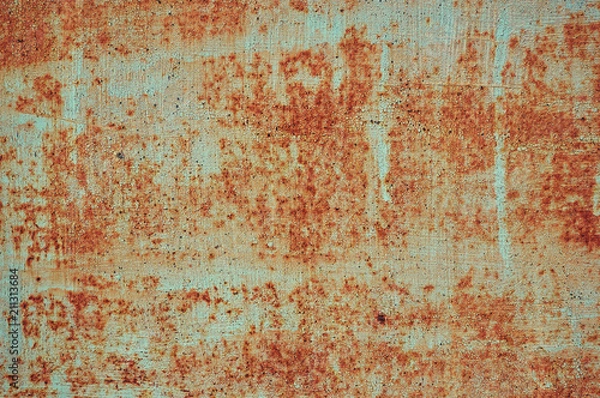 Fototapeta An old painted sheet of iron covered with rust. Abstract background.