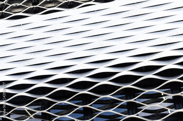 Obraz Abstract regular wavy pattern in silver steel sheet cladding
