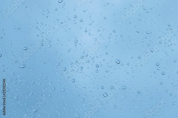 Fototapeta Water drops on glass - abstract background.