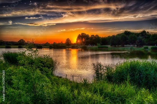 Obraz Zachód słońca nad stawem