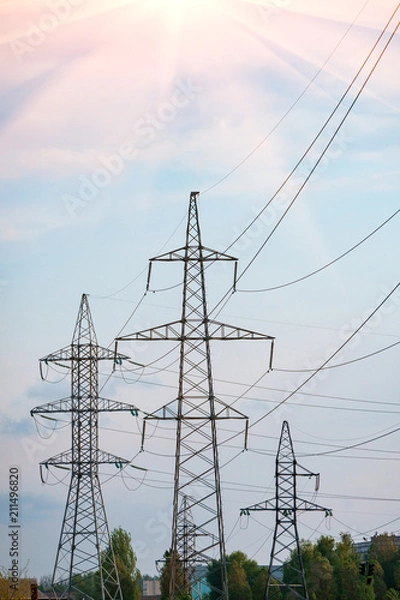 Fototapeta silhouette of high voltage electrical pole structure.