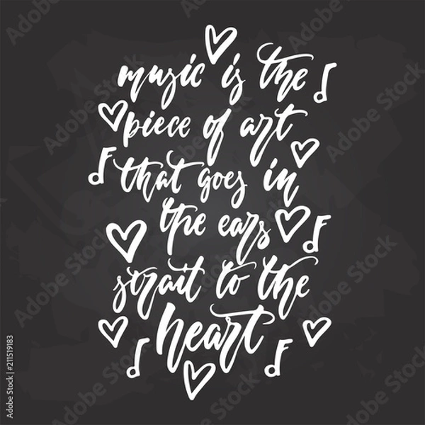 Fototapeta Music is the piece of art that goes in ears strait to heart - hand drawn Musical lettering phrase isolated on the black chalkboard background. Fun brush chalk vector quote for banners, poster design.