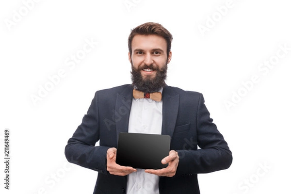 Obraz Cheerful gentleman showing new tablet