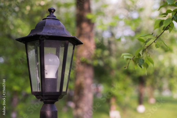 Fototapeta LED street lamp. Retro style lantern with modern lighting technology