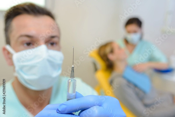 Fototapeta Man preparing syringe