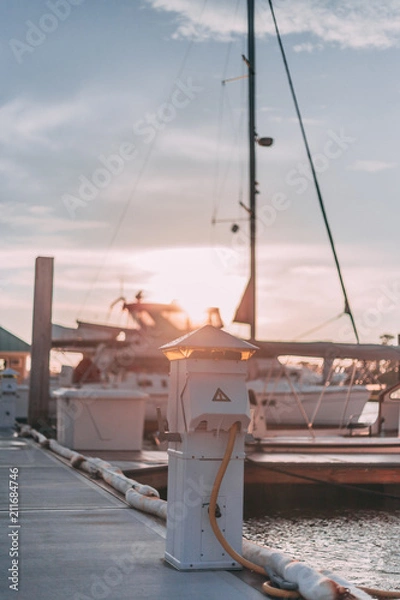 Obraz Boat at the dock at sunset
