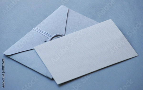 Fototapeta Stock stylish mockup photo with envelope with seal wax and a blank greeting card. Feminine photo for blog and website. Presentation photo for wedding stationery. 
