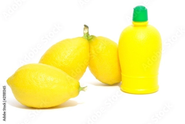 Fototapeta Limoni e bottiglia di succo di limone