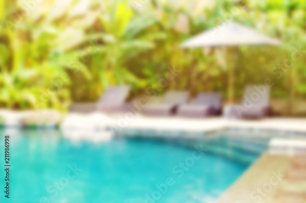 Obraz Abstract blur outdoor swimming pool background. Blur summer background for resort hotel pool party and tropical palm tree