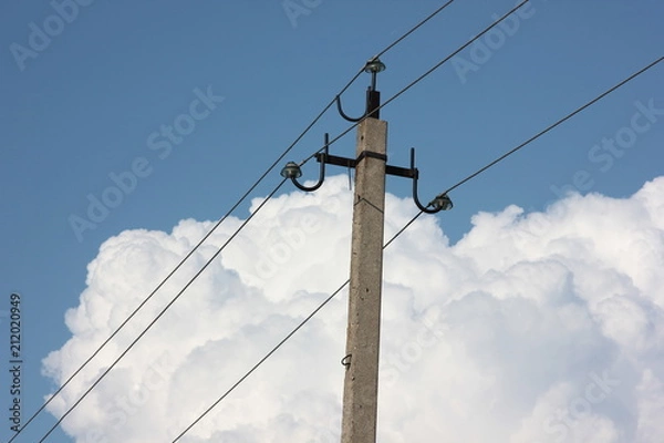 Fototapeta electrical wires on a background of clouds