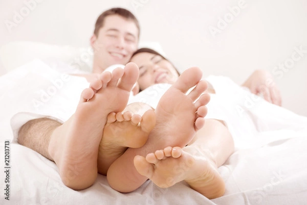 Obraz Young couple in bed.