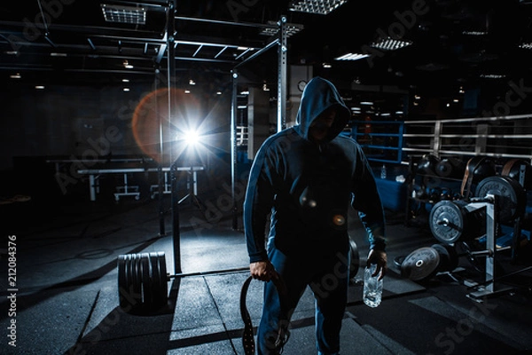 Obraz Strong man working in gym