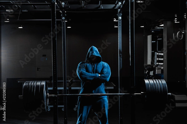 Obraz Strong man working in gym