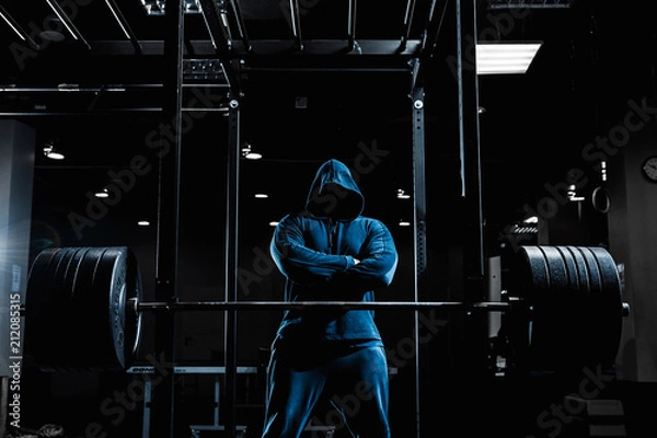 Obraz Strong man working in gym