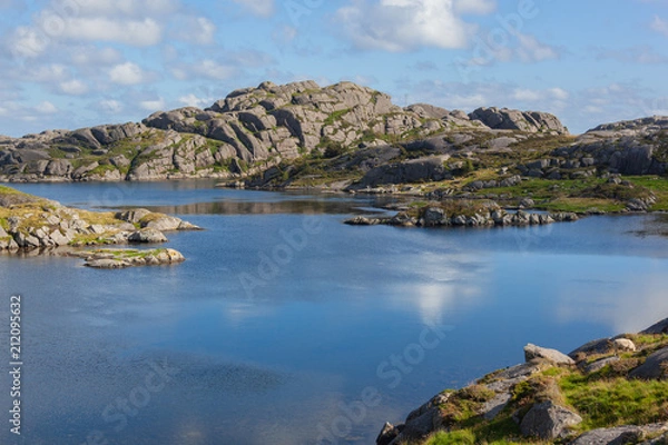 Fototapeta Stony shore of the bay along the western coast of the ocean in the Egersund region, Jaeren national scenic route, Norway