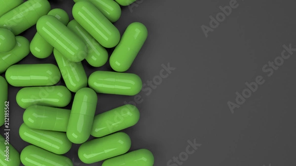 Fototapeta Pile of green medicine capsules